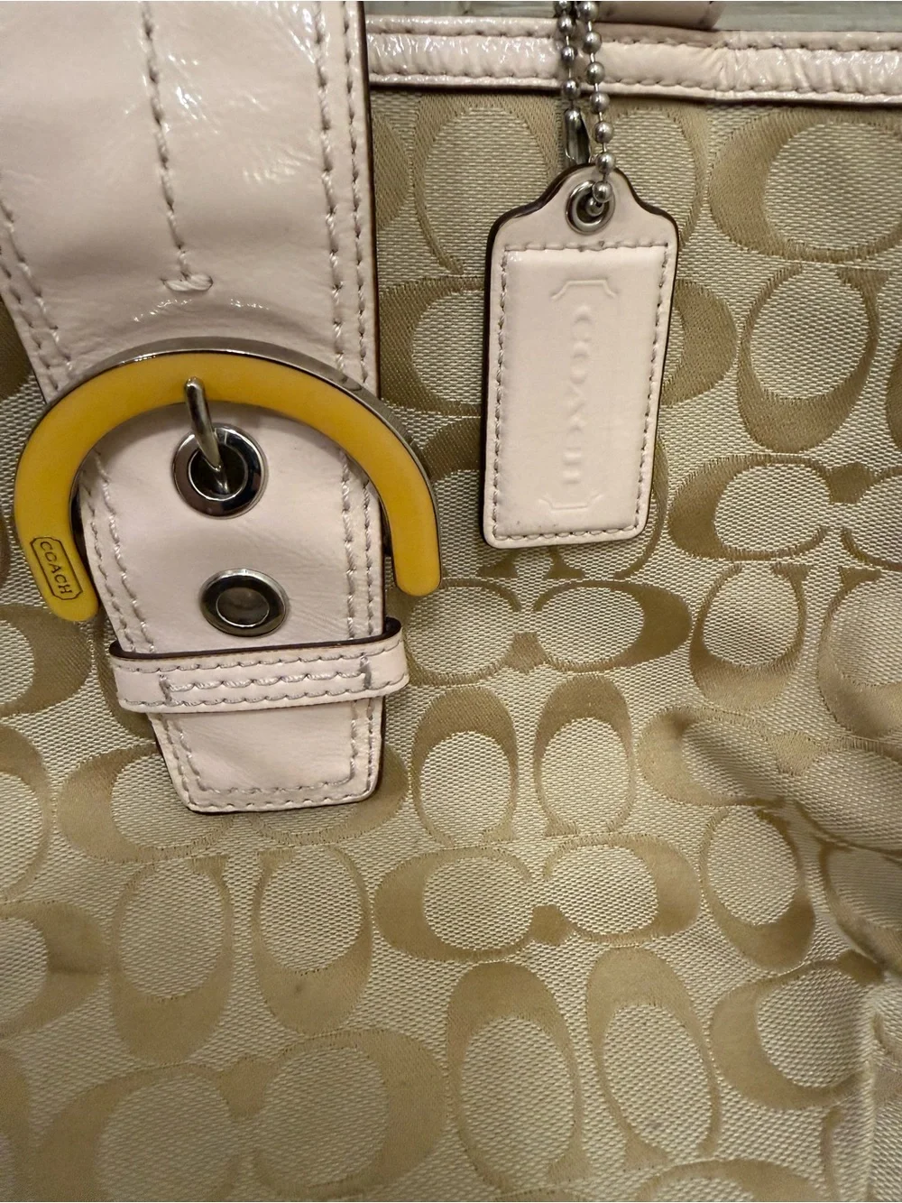 Coach VintageBeige Signature Shoulder Bag with Pale Pink Trim and Yellow Accent